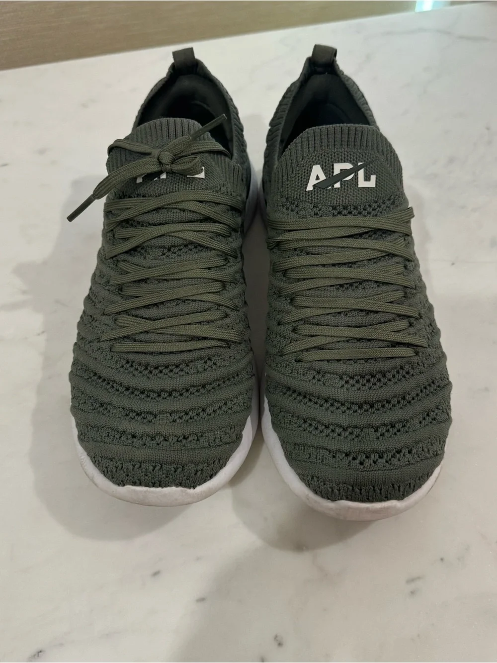 APL women’s TechLoom Knit Sneakers in Olive green